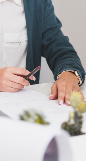 Person reading the will before signing it at Clark Woods LLP in the Lower Mainland